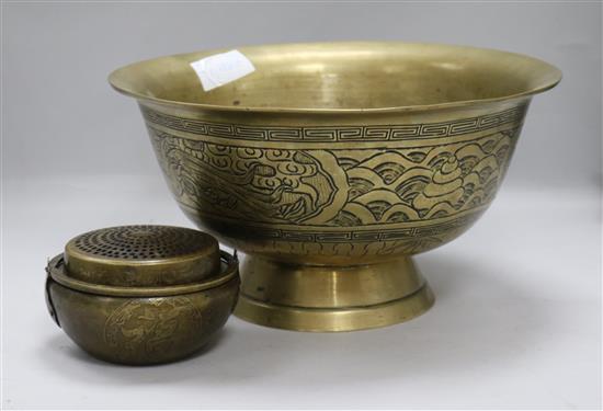 A Chinese bronze handwarmer and a bronze basin, basin 12.5in.